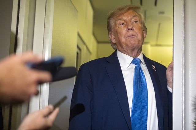 President Donald Trump speaks with reporters while flying aboard Air Force One en route from Calgary, Canada to Joint Base Andrews, Md., late Monday, June 16, 2025.