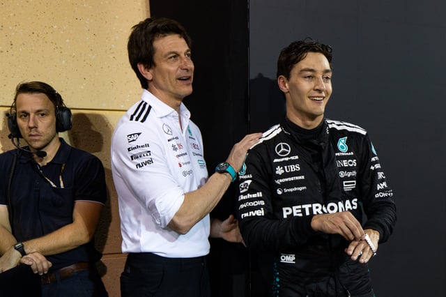 George Russell of Great Britain and Mercedes is congratulated by Mercedes CEO and Team Principal Toto Wolff in parc ferme during the F1 Grand Prix of Bahrain at Bahrain International Circuit on April 13, 2025 in Bahrain, Bahrain.