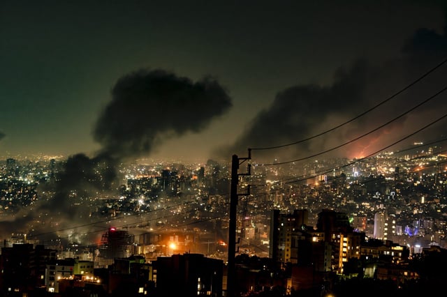 Smoke over the Iranian capital of Tehran after Israeli missile strikes on Sunday.