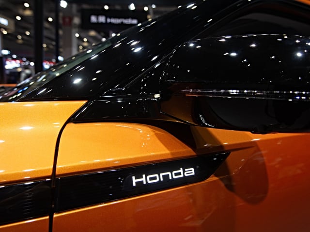 The Honda booth is at the National Exhibition Center in Shanghai, China, on April 25, 2025, during the first day of public viewing of the Shanghai International Automobile Show. (Photo by Ying Tang/NurPhoto)