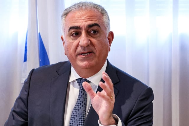 Reza Pahlavi, activist, advocate and oldest son of the last Shah of Iran, speaks during a meeting with Israel&#39;s intelligence minister at a hotel in Tel Aviv on April 19, 2023.