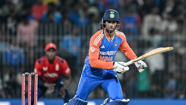 India's Tilak Varma watches the ball after playing a shot during the second Twenty20 international cricket match between India and England in January 2025