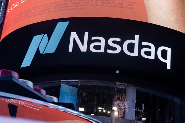 The Nasdaq logo is displayed at the Nasdaq Market site in Times Square in New York City, U.S., December 3, 2021. REUTERS/Jeenah Moon/File Photo