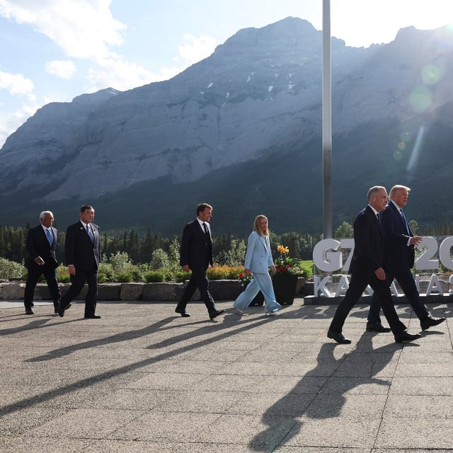European Council President Antonio Costa, Japan's Prime Minister Shigeru Ishiba, Italian Prime Minister Giorgia Meloni, French President Emmanuel Macron, Canada's Prime Minister Mark Carney and U.S. President Donald Trump leave after a photo session during the G7 Summit, in Kananaskis, Alberta, on Monday.