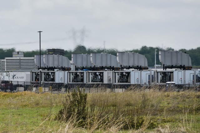 MEMPHIS, TN - APRIL 25: Gas turbines are visible at an xAI data center on Riverport Rd in Memphis, TN on April 25, 2025. (Photo by Brandon Dill for The Washington Post)