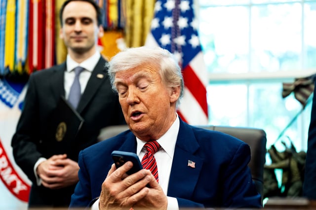 President Donald Trump silenced his cellphone in the Oval Office of the White House on May 23, 2025.