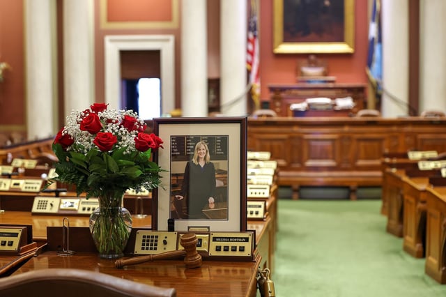 A memorial is seen on the desk of state Rep. Melissa Hortman in the House chambers at the Minnesota State Capitol on Monday.