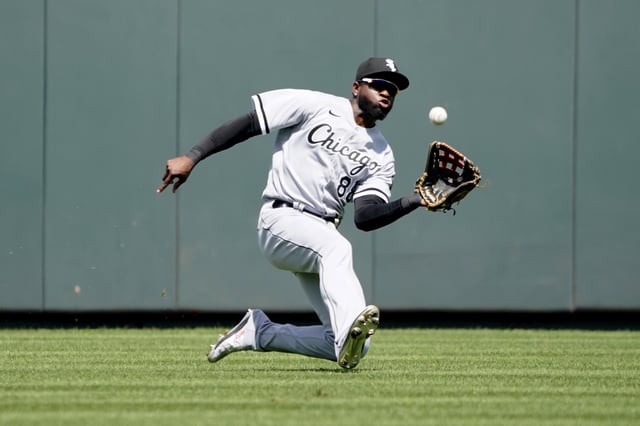 KANSAS CITY, MISSOURI - AUGUST 22: Luis Robert #88 of the Chicago White Sox catches a ball hit by Michael Massey of the Kansas City Royals in the third inning at Kauffman Stadium on August 22, 2022 in Kansas City, Missouri.