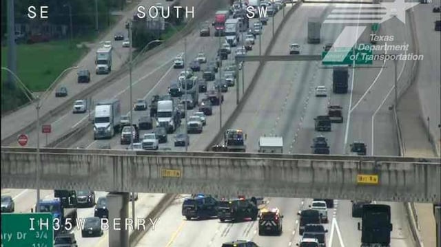 A crash involving an 18-wheeler shut down three southbound lanes of Interstate 35W in south Fort Worth on Wednesday, officials say. At least one person was injured.