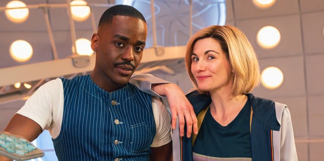 Ncuti Gatwa as the Fifteenth Doctor and Jodie Whittaker as the Thirteenth Doctor pose together in the TARDIS in Doctor Who.