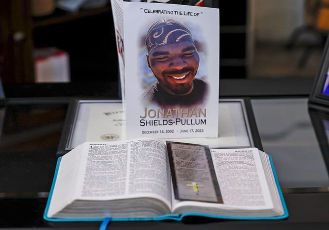 Terrance Pullum looks at a memorial of his son, Jonathan Pullum,  on June 15, 2024 in Birmingham, Alabama. (Photo/ Butch Dill)
