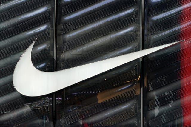 The Nike swoosh logo is seen outside the store on 5th Ave in New York, New York, U.S., March 19, 2019.   REUTERS/Carlo Allegri/File photo