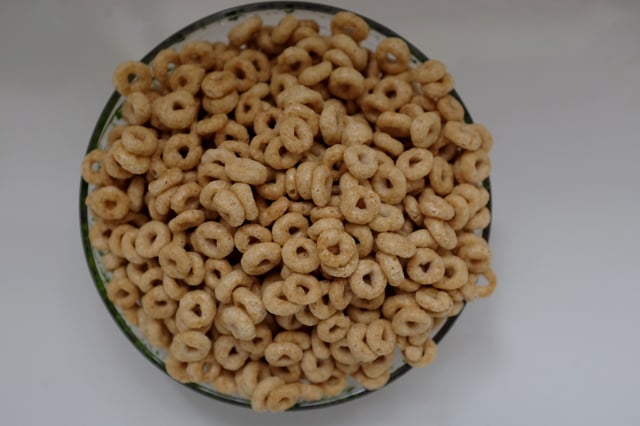 In this photo illustration, the General Mills cereal Honey Nut Cheerios is seen on September 23, 2014 in Miami, Florida.
