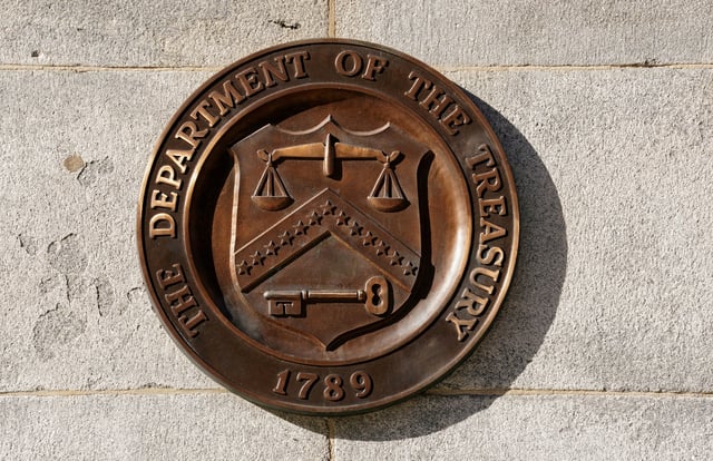 A bronze seal for the Department of the Treasury is shown at the U.S. Treasury building in Washington, U.S., January 20, 2023. REUTERS/Kevin Lamarque/File Photo