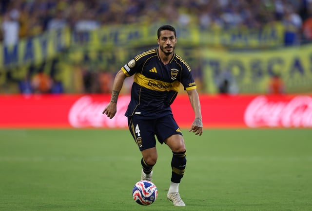 Jun 16, 2025; Miami Gardens, Florida, USA; CA Boca Juniors defender Nicolas Figal (4) dribbles downfield during the second half against SL Benfica in a group stage match of the 2025 FIFA Club World Cup at Hard Rock Stadium. Mandatory Credit: Nathan Ray Seebeck-Imagn Images
