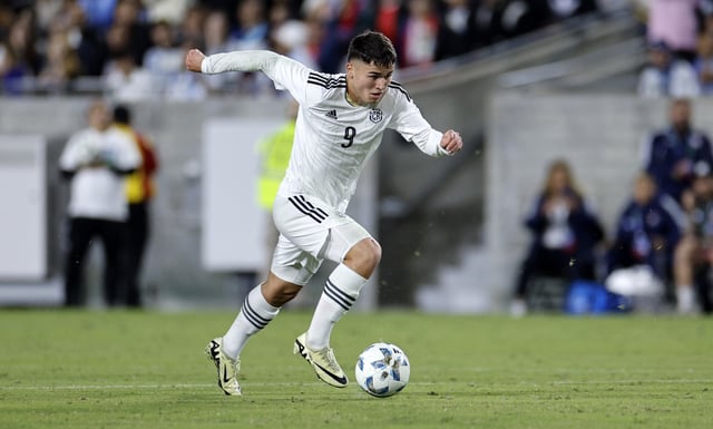 Manfred Ugalde #9 of Costa Rica controls the ball during the first half of the international friendly match against Argentina at United Airlines Field at the Los Angeles Memorial Coliseum on March 26, 2024 in Los Angeles, California.