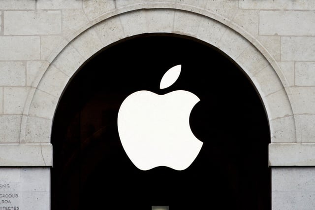 Apple logo is seen on the Apple store at The Marche Saint Germain in Paris, France July 15, 2020.  REUTERS/Gonzalo Fuentes/File Photo