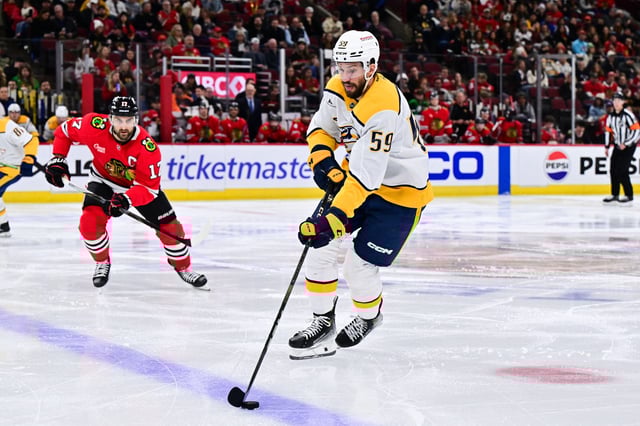 Feb 7, 2025; Chicago, Illinois, USA; Nashville Predators defenseman Roman Josi (59) skates with the puck against the Chicago Blackhawks during the second period at the United Center. Mandatory Credit: Daniel Bartel-Imagn Images/File Photo