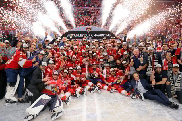 Jun 17, 2025; Sunrise, Florida, USA; The Florida Panthers pose for a photo with the Stanley Cup after winning game six of the 2025 Stanley Cup Final against the Edmonton Oilers at Amerant Bank Arena. Mandatory Credit: Sam Navarro-Imagn Images     TPX IMAGES OF THE DAY