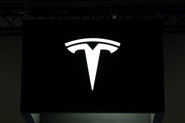 The Tesla logo is seen during the Viva Technology conference dedicated to innovation and startups at Porte de Versailles exhibition center in Paris, France, June 12, 2025. REUTERS/Benoit Tessier