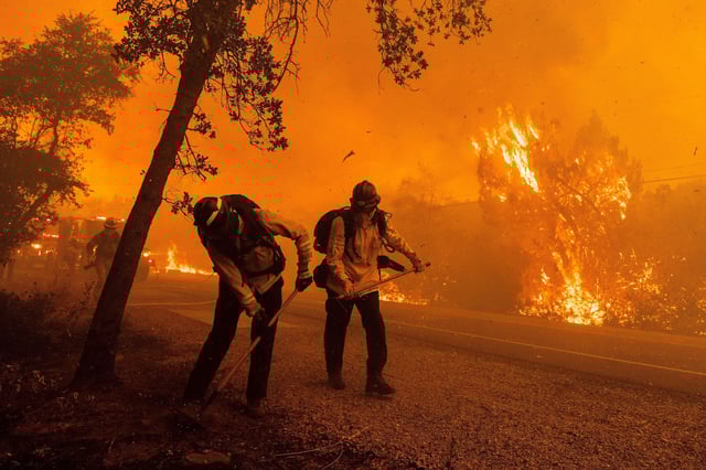 Firefighters during the Thompson fire in Oroville, California, 2024. Credit: UPI / Alamy Stock Photo.