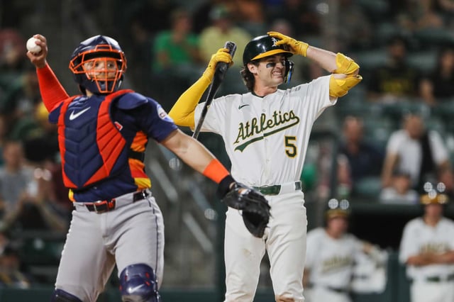 Athletics&#39; Jacob Wilson (5) reacts after striking out during the seventh inning of a baseball game against the Houston Astros Wednesday, June 18, 2025, in West Sacramento, Calif. (AP Photo/Scott Marshall)