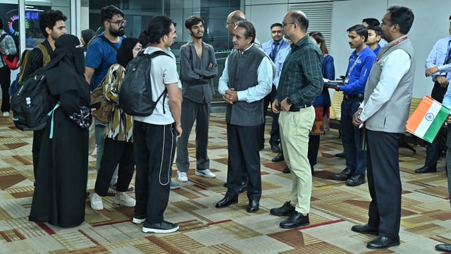 Minister of State for External Affairs Kirti Vardhan Singh meets the Indian students returning from war-torn Iran via Armenia.