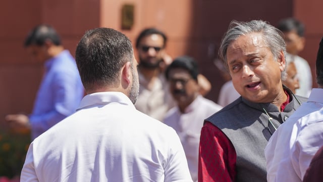 Congress MPs Rahul Gandhi and Shashi Tharoor during the Budget session of Parliament in New Delhi.