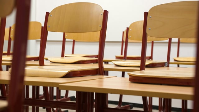 A Nigerian university drew criticism as staff were seen touching students to check for bras before exams.