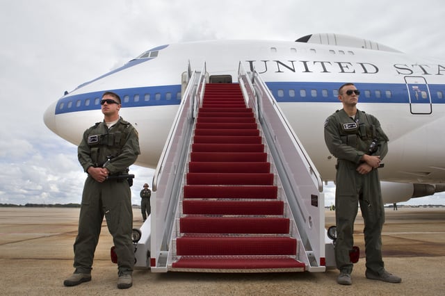 Members of the U.S. Air Combat Command Security Forces guard the E-4B plane on September 28, 2013 at Andrews Air Force Base, Maryland.