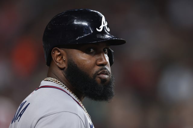 PHOENIX, ARIZONA - APRIL 27: Marcell Ozuna #20 of the Atlanta Braves on deck during the MLB game at Chase Field on April 27, 2025 in Phoenix, Arizona. (Photo by Christian Petersen/Getty Images)