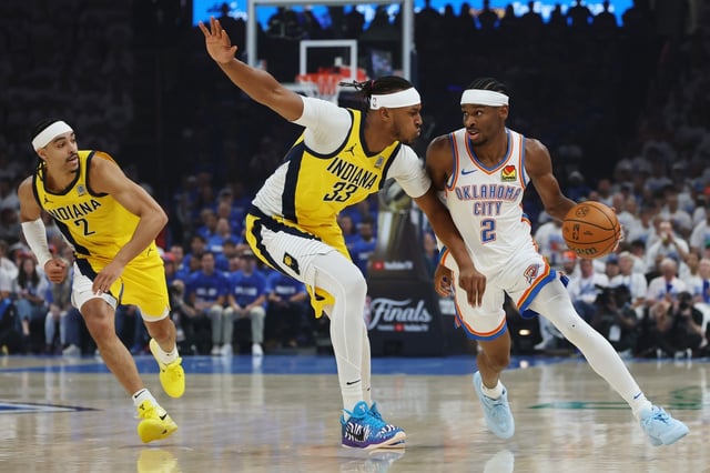 OKLAHOMA CITY, OKLAHOMA - JUNE 16:  Shai Gilgeous-Alexander #2 of the Oklahoma City Thunder is defended by Myles Turner #33 of the Indiana Pacers during the first quarter in Game Five of the 2025 NBA Finals at Paycom Center on June 16, 2025 in Oklahoma City, Oklahoma. NOTE TO USER: User expressly acknowledges and agrees that, by downloading and or using this photograph, User is consenting to the terms and conditions of the Getty Images License Agreement. (Photo by Matthew Stockman/Getty Images)