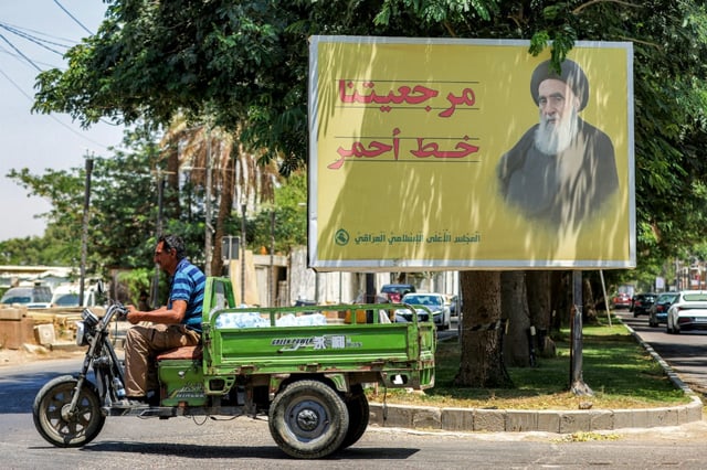 A billboard depicting Iraq's top Shiite cleric Ayatollah Ali al-Sistani, in Baghdad
