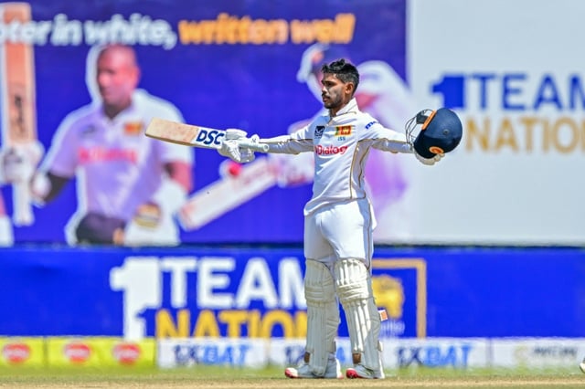 Sri Lanka's Pathum Nissanka celebrates after scoring a century during the third day of the first Test match between Sri Lanka and Bangladesh