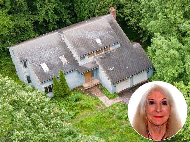 This aerial photo taken June 17, 2025, in Glastonbury, Conn. shows the home of Mary Notarangelo, a 73-year-old woman who was found dead under piles of debris in her home in February, months after she was reported missing. (Dave Zajac/Hearst Connecticut Media via AP)(Glastonbury Police Department)