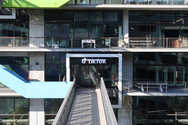 A logo is displayed over a door at the U.S. headquarters of the social media company TikTok in Culver City, California, U.S. January 17, 2025.  REUTERS/David Swanson/File Photo