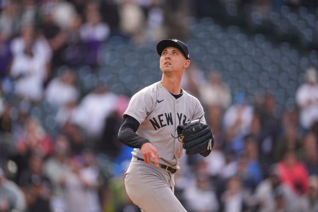 New York Yankees relief pitcher Luke Weaver (30) in the ninth inning of a baseball game Sunday, May 25, 2025, in Denver. (AP Photo/David Zalubowski)