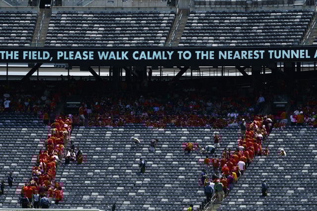 Soccer Football - FIFA Club World Cup - Group A - Palmeiras v Al Ahly - MetLife Stadium, East Rutherford, New Jersey, U.S. - June 19, 2025 Fans leave the stands as the match is suspended due to adverse weather REUTERS/Susana Vera