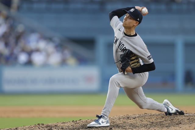 LOS ANGELES, CALIFORNIA - MAY 31: Luke Weaver #30 of the New York Yankees pitches in the in the seventh inning against the Los Angeles Dodgers at Dodger Stadium on May 31, 2025 in Los Angeles, California.