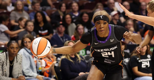 UNCASVILLE, CT - JUNE 18:  Aneesah Morrow of the Connecticut Sun dribbles the ball during the game on June 18, 2025 at the Mohegan Sun Arena in Uncasville, Connecticut. (Photo by Chris Marion/NBAE via Getty Images)