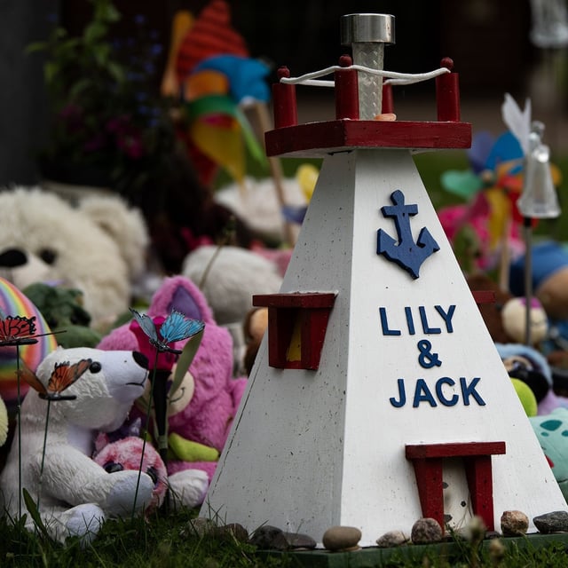 A growing memorial for missing siblings Lilly Sullivan, 6, and her brother, Jack, 4, outside the RCMP detachment in Stellarton, NS.