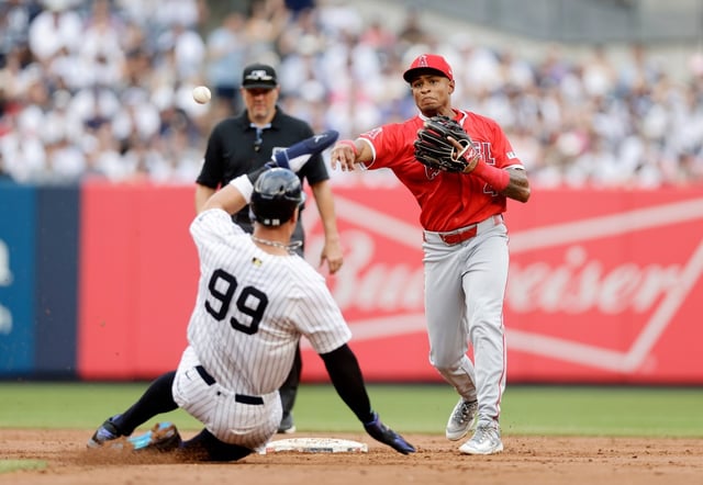 Angels second baseman Christian Moore throws to complete a third-inning double play after forcing out the Yankees’ Aaron Judge on Thursday, June 19, 2025, in New York City. (Photo by Jim McIsaac/Getty Images)