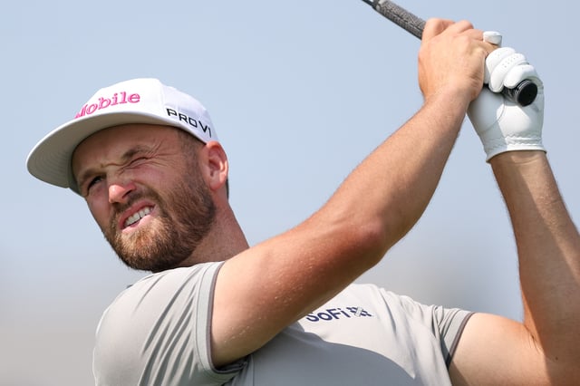 Jun 12, 2025; Oakmont, Pennsylvania, USA; Wyndham Clark plays his shot from the tenth tee during the first round of the U.S. Open golf tournament. Mandatory Credit: Bill Streicher-Imagn Images/File Photo