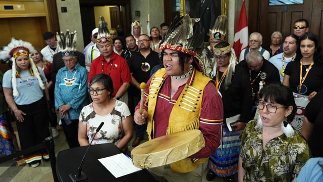 Raymond Kataquapit, youth councillor for Chiefs of Ontario and Nishnawbe Aski Nation, sings before speaking at a news conference on C-5 in the foyer of the House of Commons on Parliament Hill in Ottawa on Tuesday, June 17, 2025. THE CANADIAN PRESS/Justin Tang