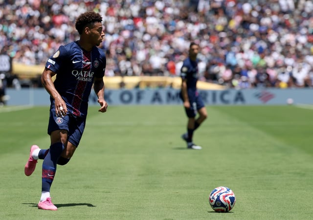 Désiré Doué #14 of Paris Saint-Germain controls the ball as he looks to cross during the FIFA Club World Cup 2025 group B match between Paris Saint-Germain FC and Club Atletico de Madrid at Rose Bowl Stadium on June 15, 2025 in Pasadena, California.