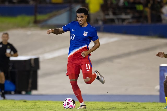 Malik Tillman #17 of the United States passes the ball during a game between Jamaica and USMNT at National Stadium on November 14, 2024, in Kingston, Jamaica.