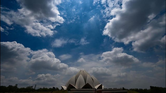 Clouds above the Lotus Temple in New Delhi on Thursday. (Sanchit Khanna/HT Photo)
