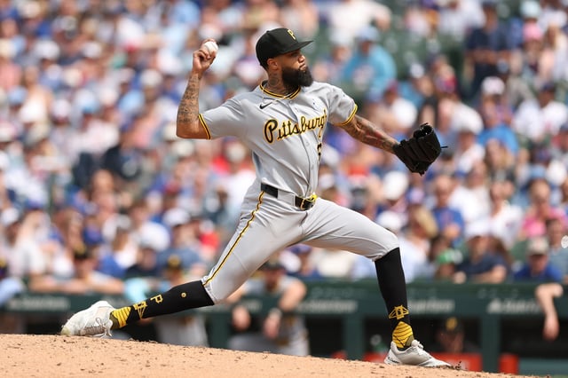 CHICAGO, ILLINOIS - JUNE 15: Dennis Santana #60 of the Pittsburgh Pirates delivers a pitch during the ninth inning against the Chicago Cubs at Wrigley Field on June 15, 2025 in Chicago, Illinois.