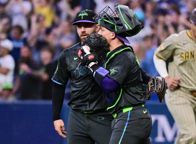 Hunter Bigge #43 of the Tampa Bay Rays celebrates with Ben Rortvedt #30 after defeating the San Diego Padres 11-4 at Tropicana Field on August 31, 2024 in St Petersburg, Florida.