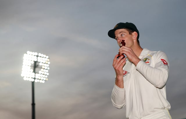 Cricket - Ashes 2019 - Fifth Test - England v Australia - Kia Oval, London, Britain - September 15, 2019  Australia's Tim Paine celebrates with the Ashes urn after drawing the series to retain the Ashes  Action Images via Reuters/Andrew Boyers/File Photo